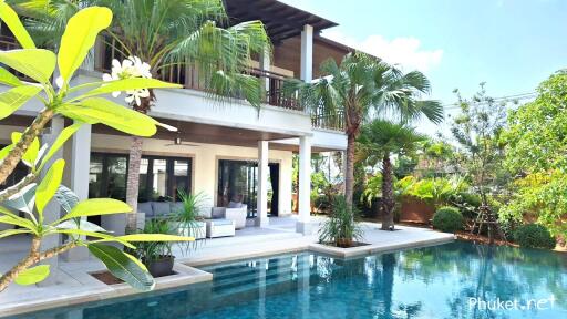 Beautiful outdoor area with pool and lounge space