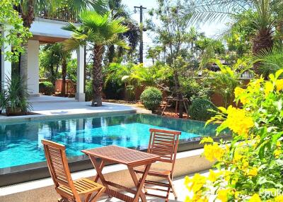 Outdoor area with swimming pool and seating