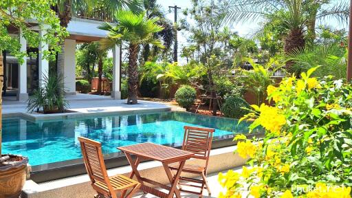 Outdoor area with swimming pool and seating