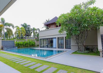 Beautiful backyard with a pool and landscaped garden