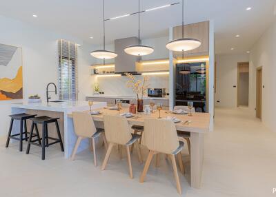 Modern kitchen and dining area with contemporary furnishings