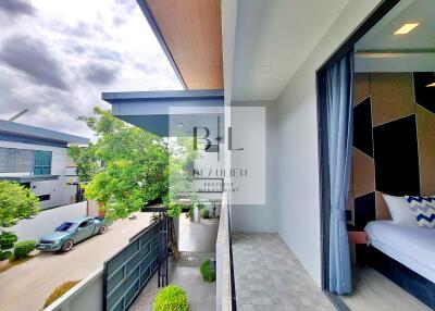 Small balcony with view of modern residential area