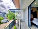 Small balcony with view of modern residential area