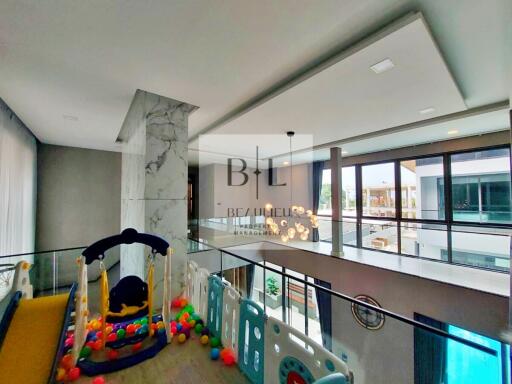 Spacious and modern interior with play area for children