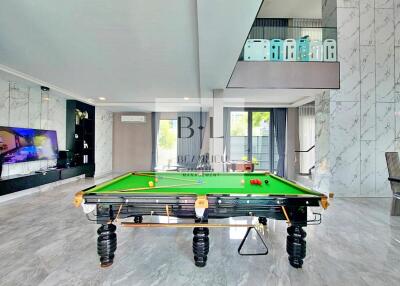 Modern living area with a pool table