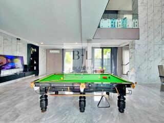 Modern living area with a pool table