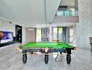 Modern living area with a pool table