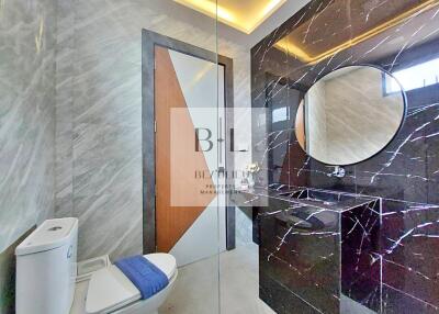 Modern bathroom with marble accents and contemporary design