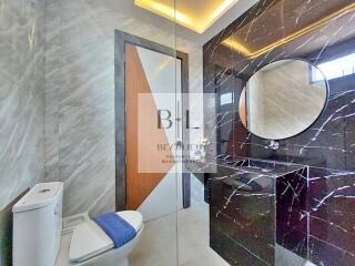 Modern bathroom with marble accents and contemporary design