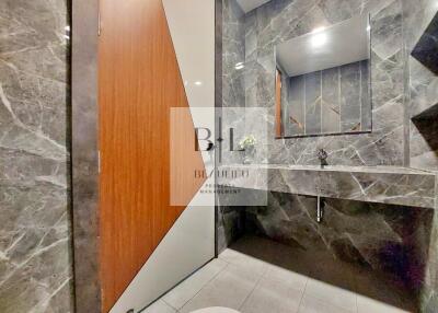 Modern bathroom with stylish marble tiles