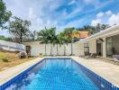 Luxury outdoor pool area with lounge seating