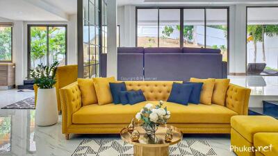 Modern living room with yellow sofa and decorative pillows