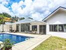 Modern house with swimming pool and patio area