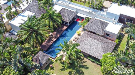 Aerial view of a luxurious residential property with pool