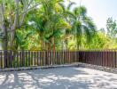 Spacious patio with lush greenery