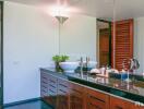 Modern bathroom with dual sinks, large mirror, and sleek design