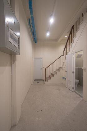 Utility area with staircase