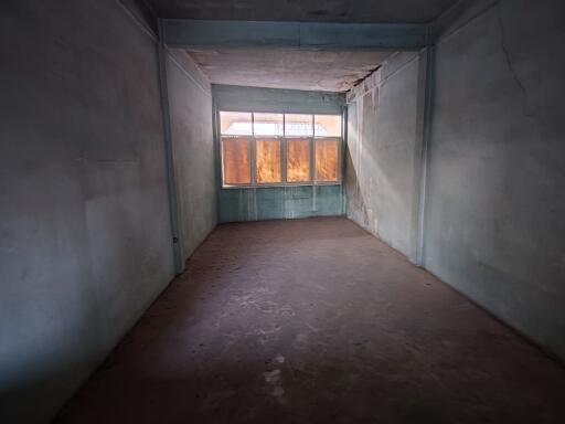 Empty run-down room with window