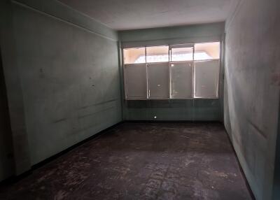 Empty room with large window