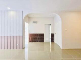 Main living area with tile flooring and modern design