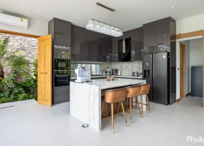 Modern kitchen with island and bar stools