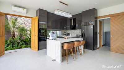 Modern kitchen with island and bar stools