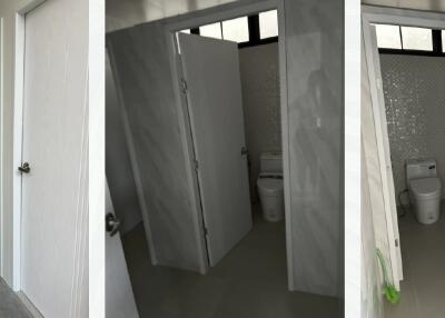 Bathroom with stall doors and toilets