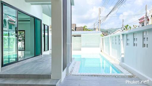 Outdoor view of a house with pool