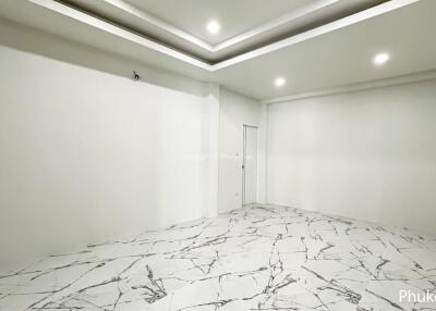 empty room with modern marble tile flooring and recessed ceiling lights