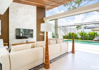 Modern living room with pool view