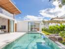 Poolside view with patio in a luxury villa