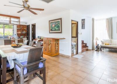 Open-concept living area with dining space and kitchen