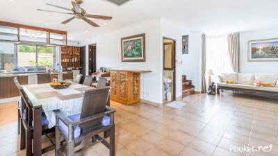 Open-concept living area with dining space and kitchen