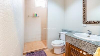 Modern bathroom with shower and vanity