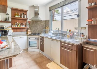 Modern kitchen with appliances and ample counter space