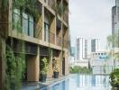 Modern building with rooftop pool and city view