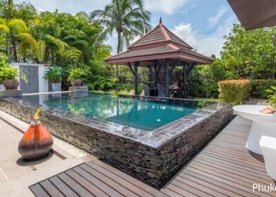 Beautiful outdoor area with a swimming pool and a gazebo
