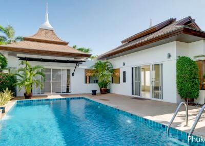 Exterior view of a house with a swimming pool