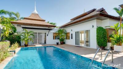 Exterior view of a house with a swimming pool