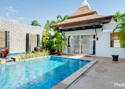 Outdoor area with swimming pool and traditional building