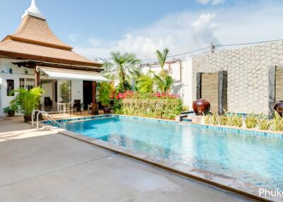 Beautiful outdoor area with pool and pavilion