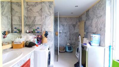 Spacious laundry room with modern amenities