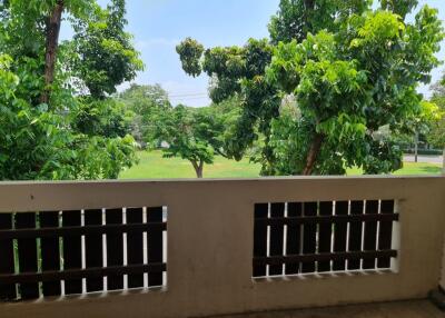 View from balcony overlooking green space