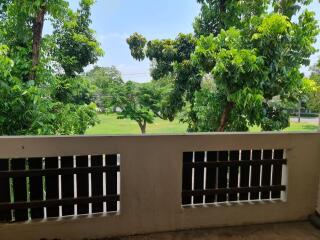 View from balcony overlooking green space