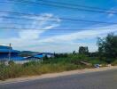 Scenic outdoor view with greenery and blue sky