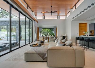 Spacious modern living room with large windows and open layout