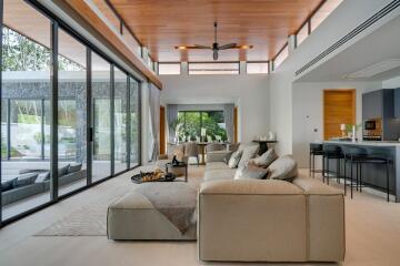 Spacious modern living room with large windows and open layout