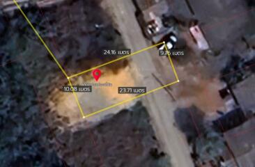 Aerial view of a land plot with marked boundaries and dimensions