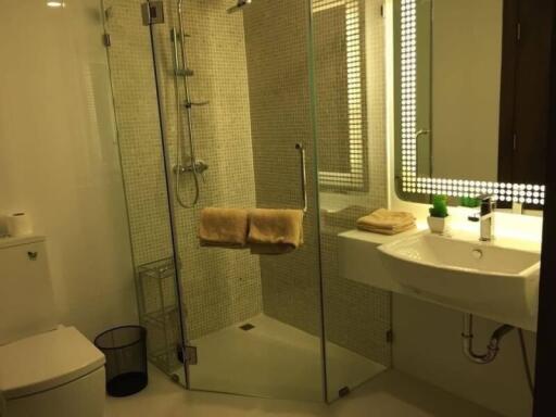 Modern bathroom with glass shower and vanity