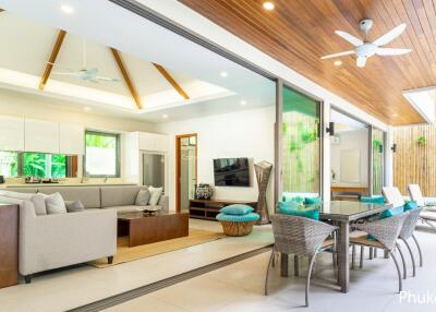 Modern open-concept living area with kitchen and dining space